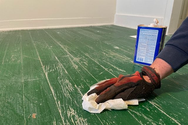 Sweeping the floor with cloth